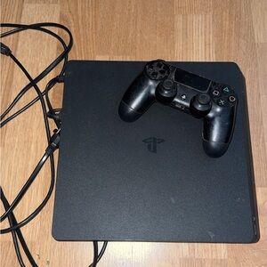 Sony Gaming Console with Black Controller